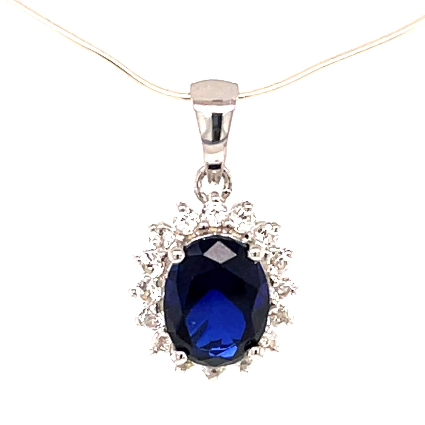 925 Sterling Silver Created Blue Sapphire, White Topaz Pendant - Pinctore