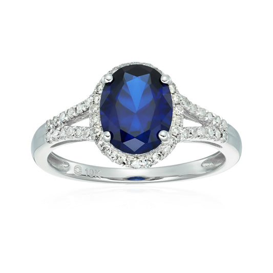 10k White Gold Created Blue Sapphire and Diamond Oval Halo Engagement Ring (1/5cttw, H-I Color, I1-I2 Clarity), - pinctore